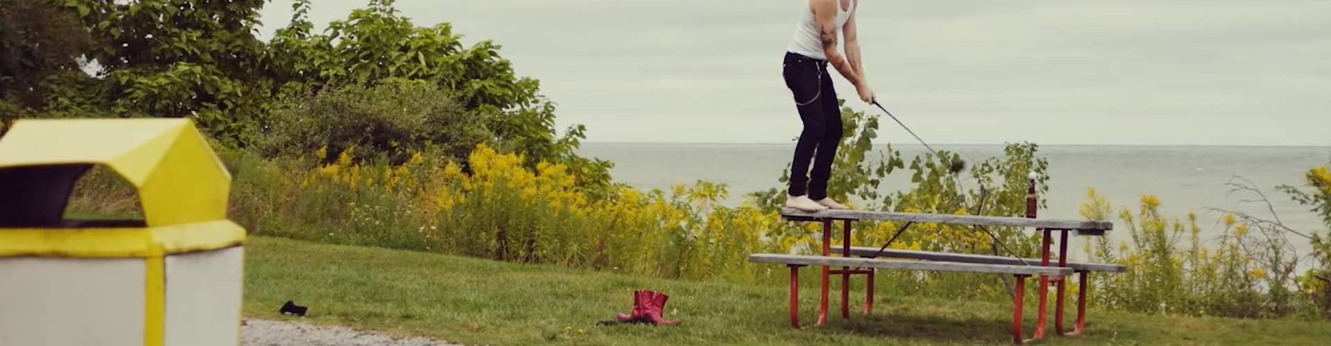 man playing golf on table top